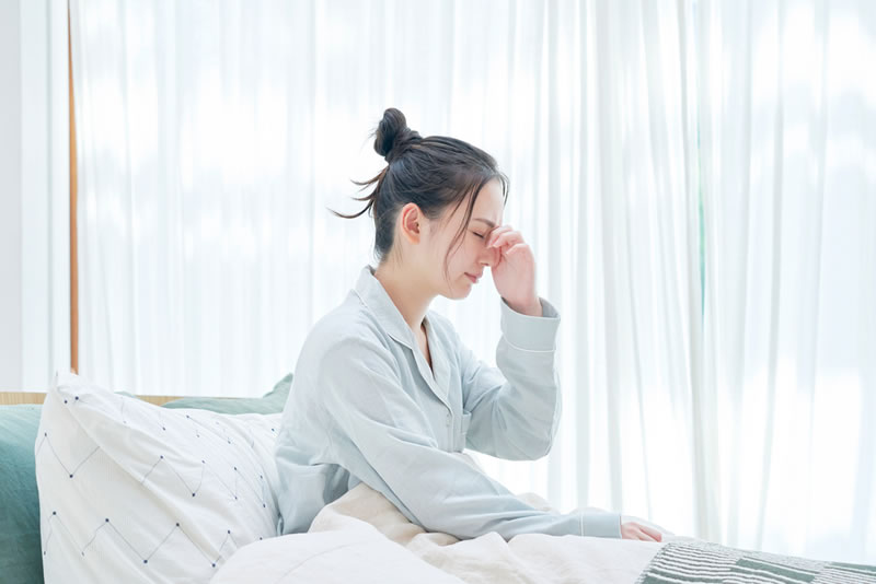 寝不足な女性
