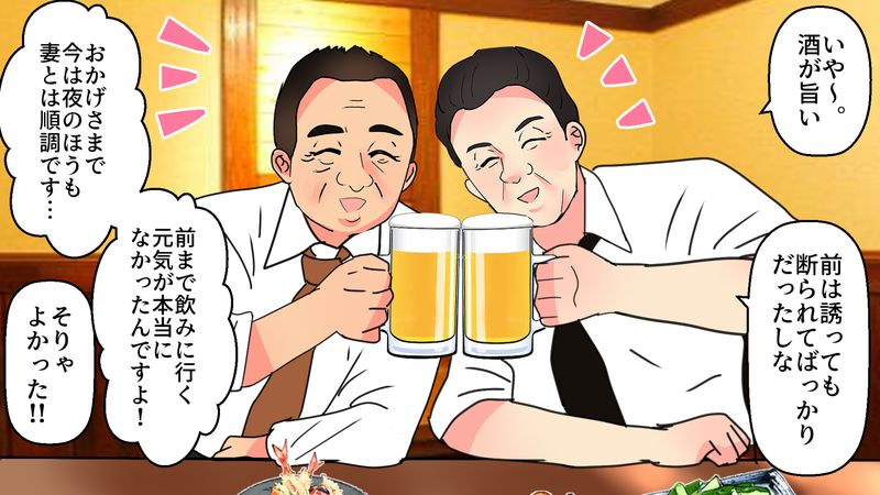 居酒屋で話し合う2人